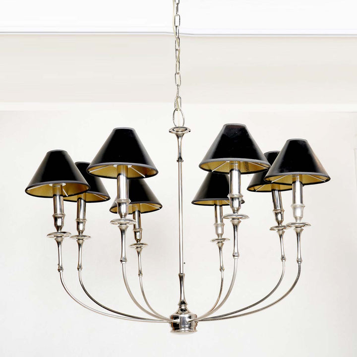 Odile 8 arms chrome finish metal chandelier with black fabric shades.