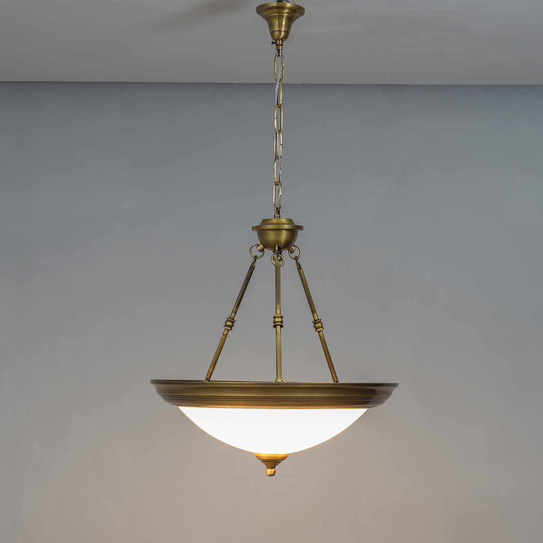 QUOIZEL Arlo 3-Light Pendant in Pure Brass with Frosted White Glass Shades
