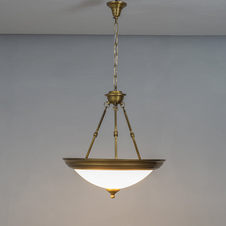 QUOIZEL Arlo 3-Light Pendant in Pure Brass with Frosted White Glass Shades