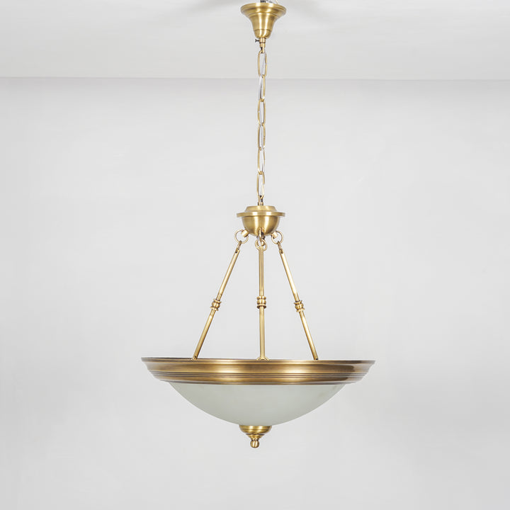 QUOIZEL Arlo 3-Light Pendant in Pure Brass with Frosted White Glass Shades