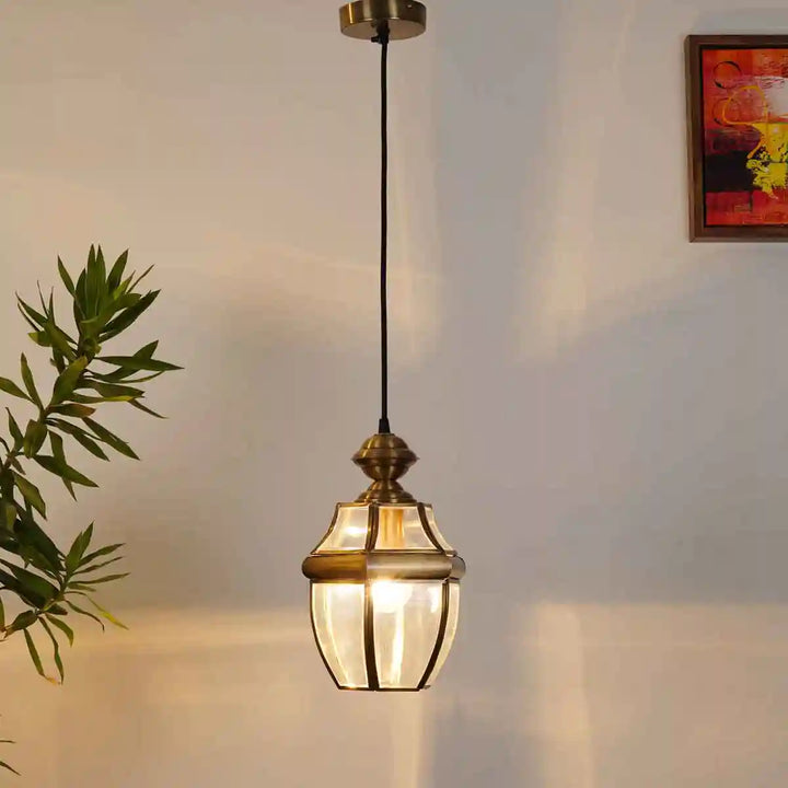 Nolan Single Light Ceiling Pendant in Antique Brass Finish