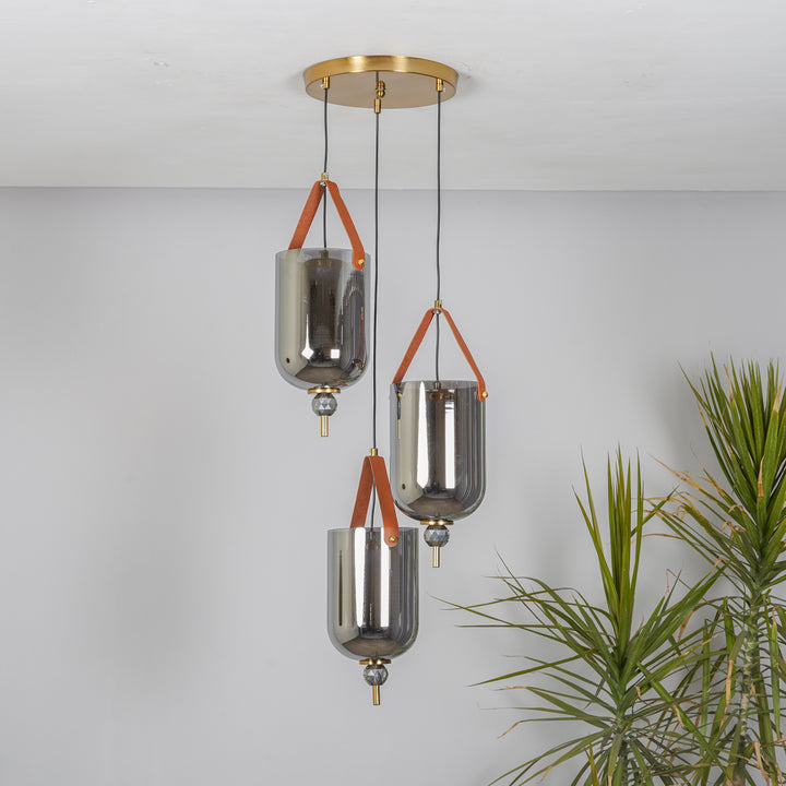 DUO Integrated 3-Light LED Ceiling Pendant In Brass Finish Metal And Brown Leather with Gray Glass Shades