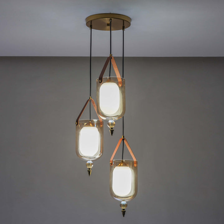 FILO 3 Light Cascade Ceiling Pendant In Brass Finish Metal And Brown Leather With Frosted White Glass Shades