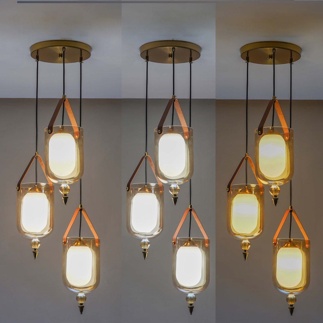 FILO 3 Light Cascade Ceiling Pendant In Brass Finish Metal And Brown Leather With Frosted White Glass Shades