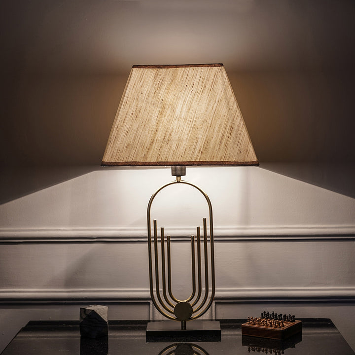 Saturn Single Light Table Lamp In Shine Brass & Black Finish With Off-White Shade