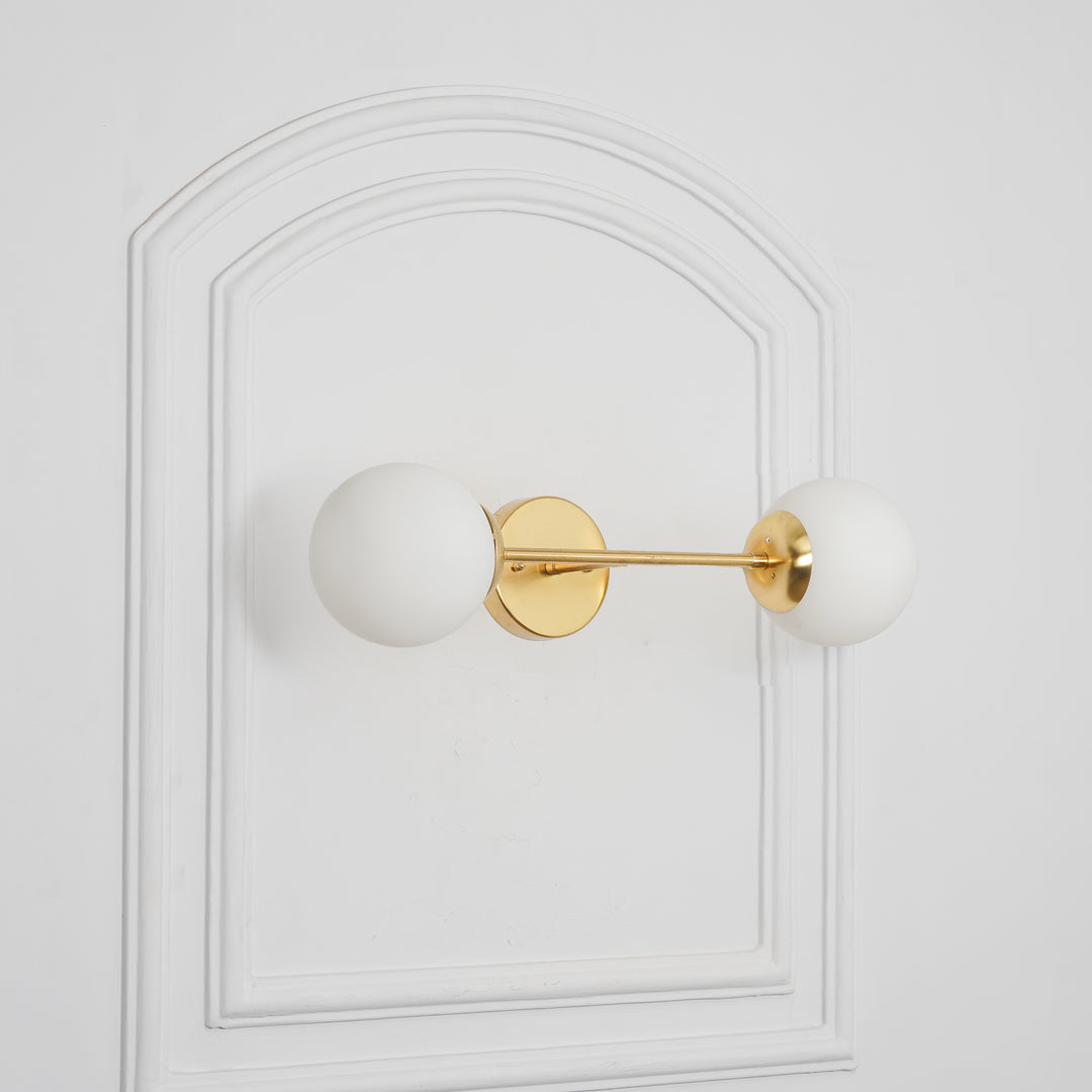 BALTS Twin Wall Mirror Light in Shine Brass Finish with Opal Glass Globe Shades