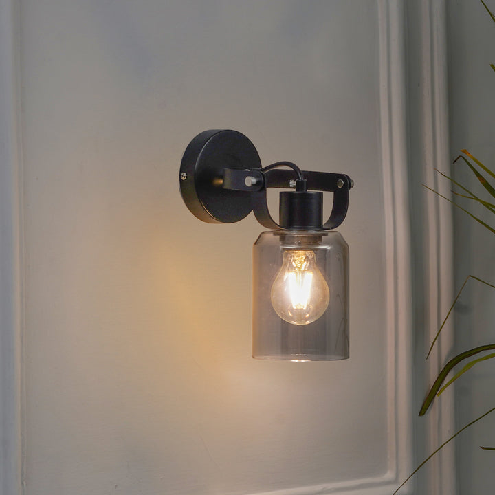 BRAVO Single Light Wall Fitting In Black Finish Metal With Smoke Glass