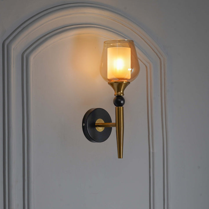 MANTIS Single Light Wall Fitting In Black And Brass Finish Metal With Amber Glass