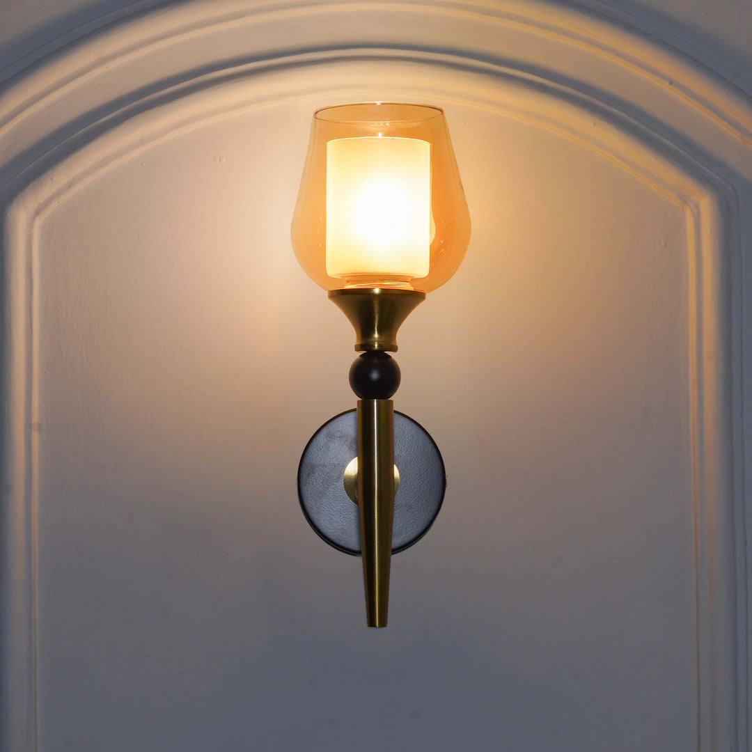 MANTIS Single Light Wall Fitting In Black And Brass Finish Metal With Amber Glass