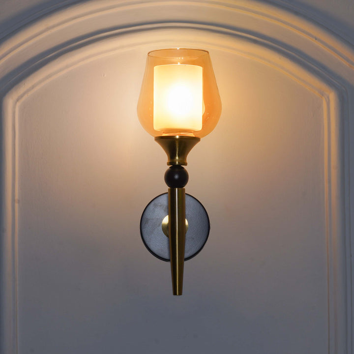 MANTIS Single Light Wall Fitting In Black And Brass Finish Metal With Amber Glass