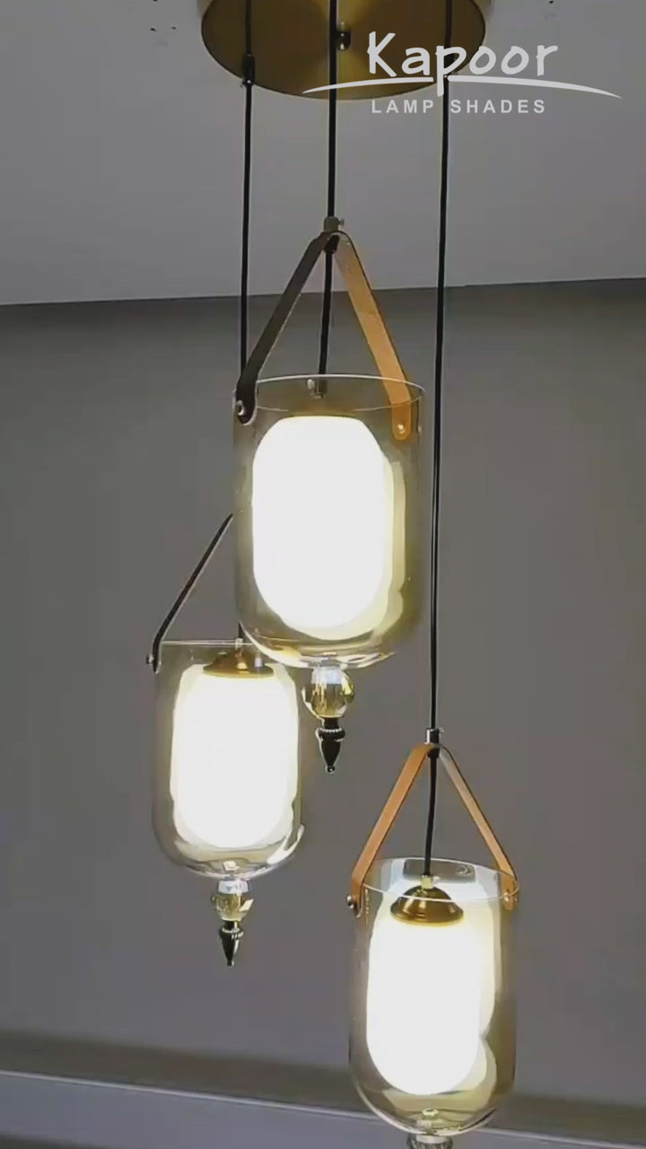 FILO 3 Light Cascade Ceiling Pendant In Brass Finish Metal And Brown Leather With Frosted White Glass Shades